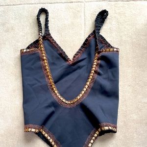 Black KIINI one piece bathing suit with gold and brown trim, size L